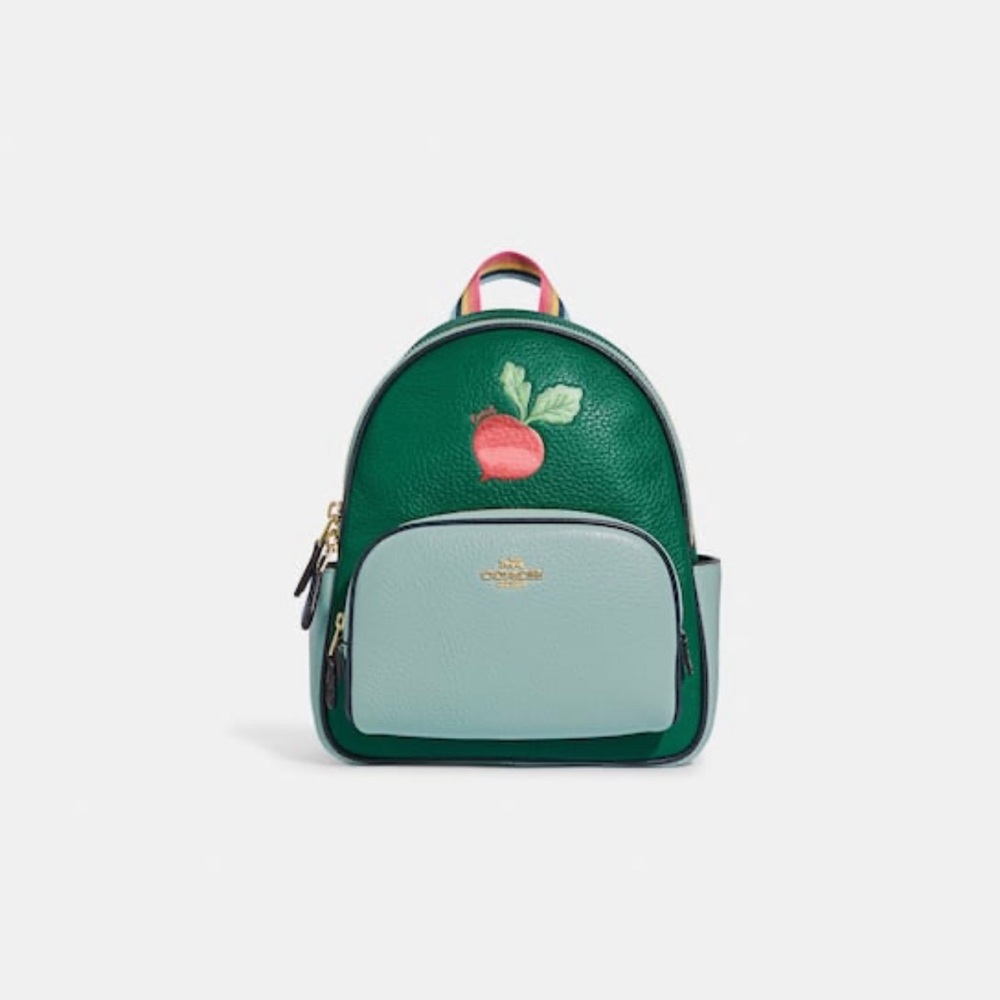 NWT Coach mini backpack in radish print